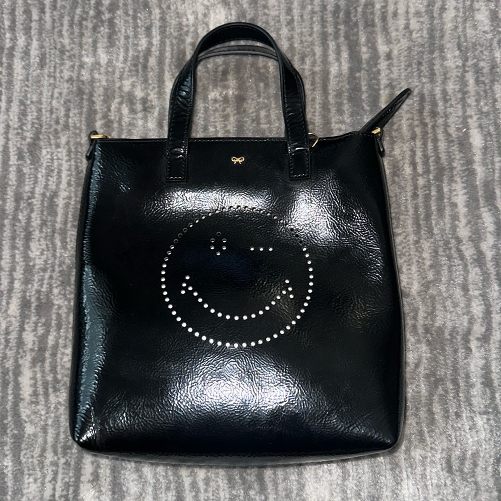 Anya Hindmarch winky face sling bag black patten leather
